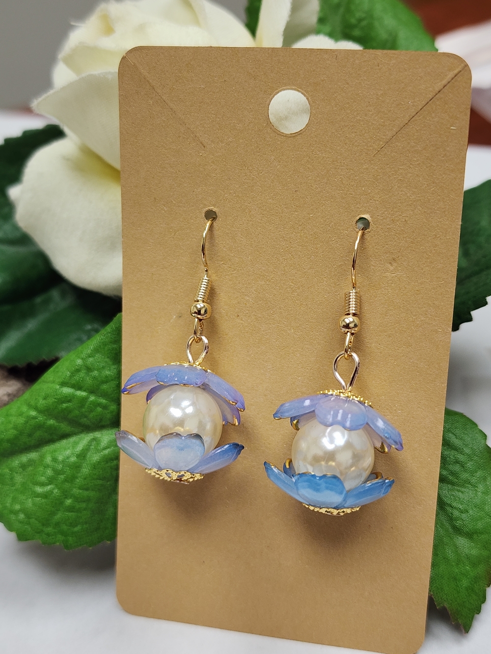 Gold Toned Faux Pearl Drop Earrings with Blue Flower Petals